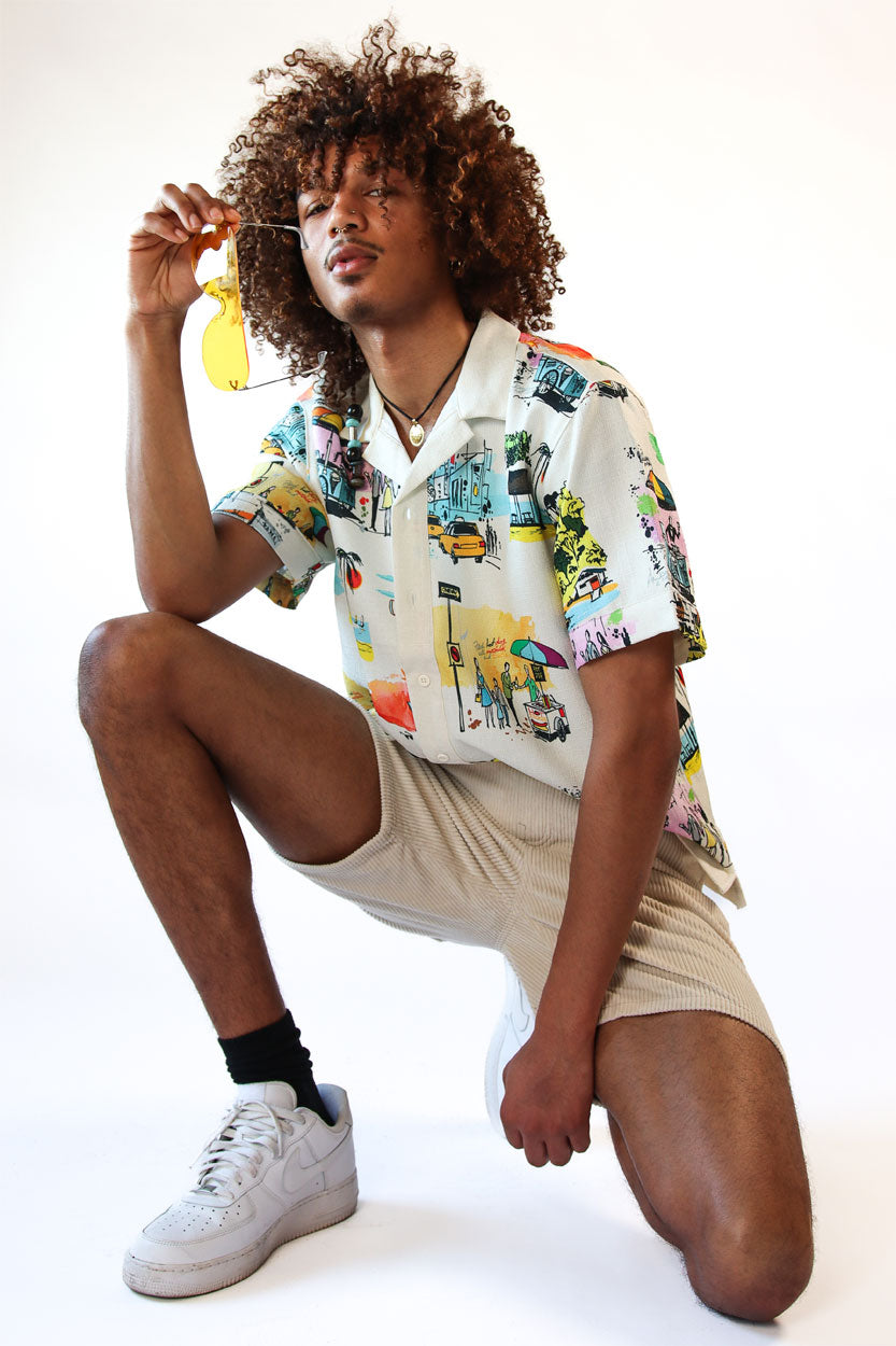 Model wearing a spring button up shirt