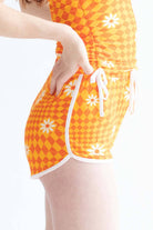 Orange Checkered Daisy Dolphin Shorts