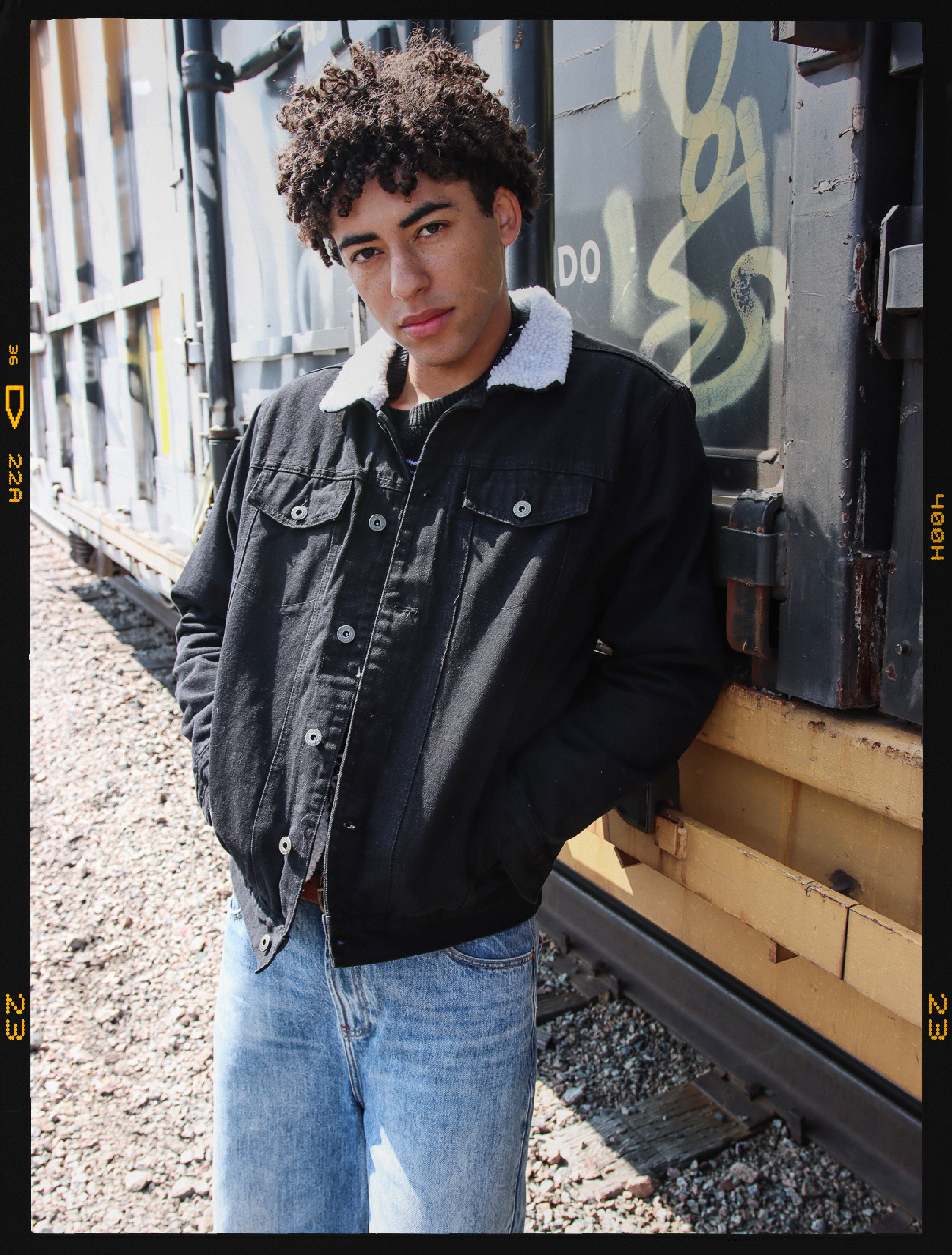 model wearing sherpa denim jacket and fall denim