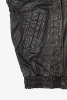 Vintage Black Leather Collection Motorcycle Vest (1990s)