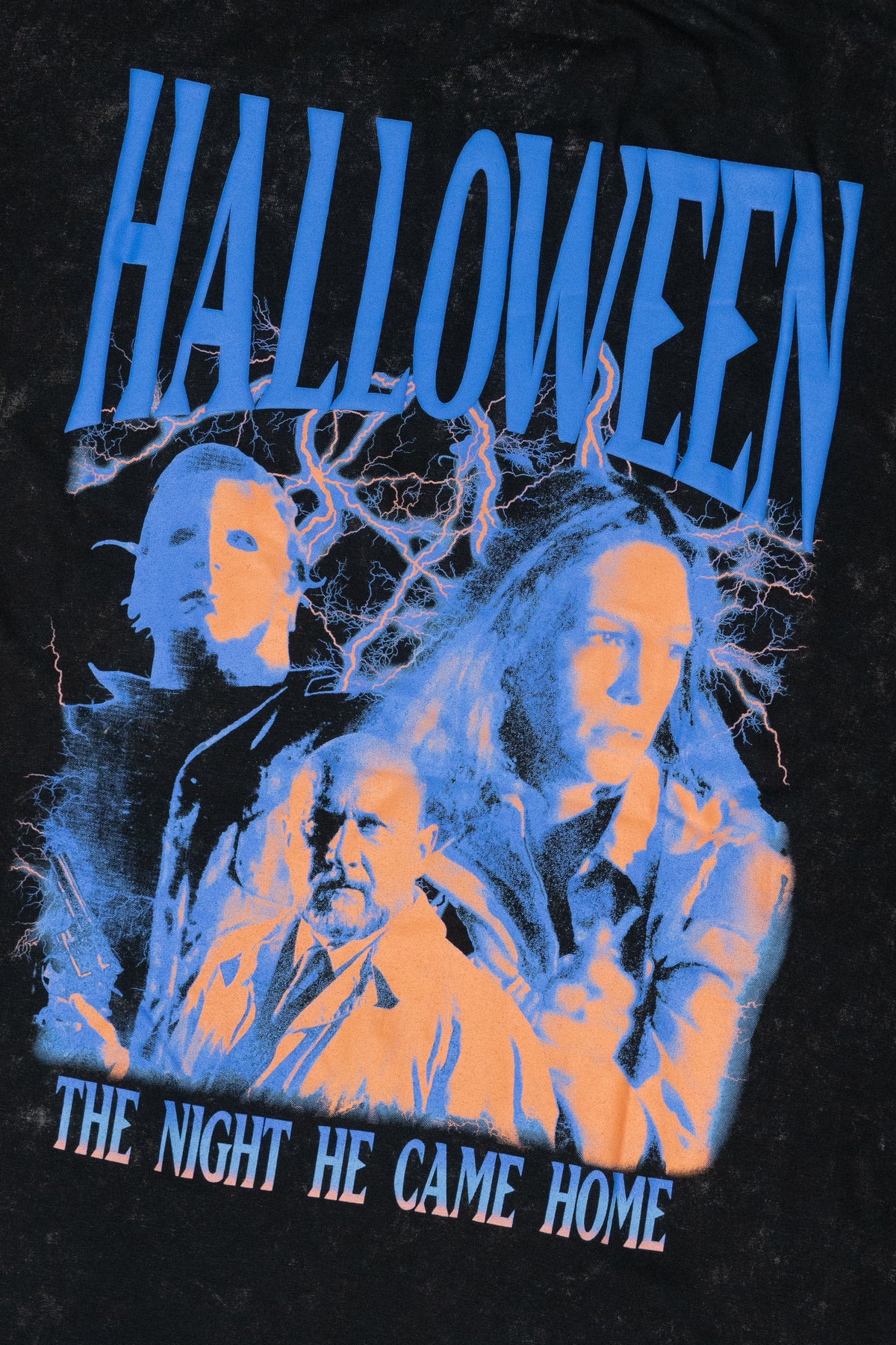 Halloween graphic tee with blue and orange movie montage and text Halloween The Night He Came Home