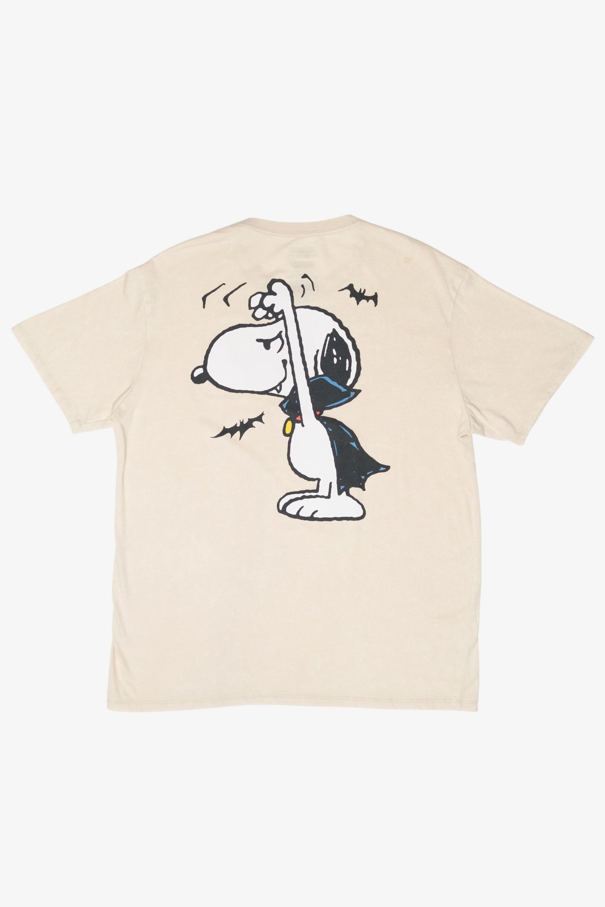 Back of cream t-shirt featuring Snoopy dressed as a vampire with a cape and bats
