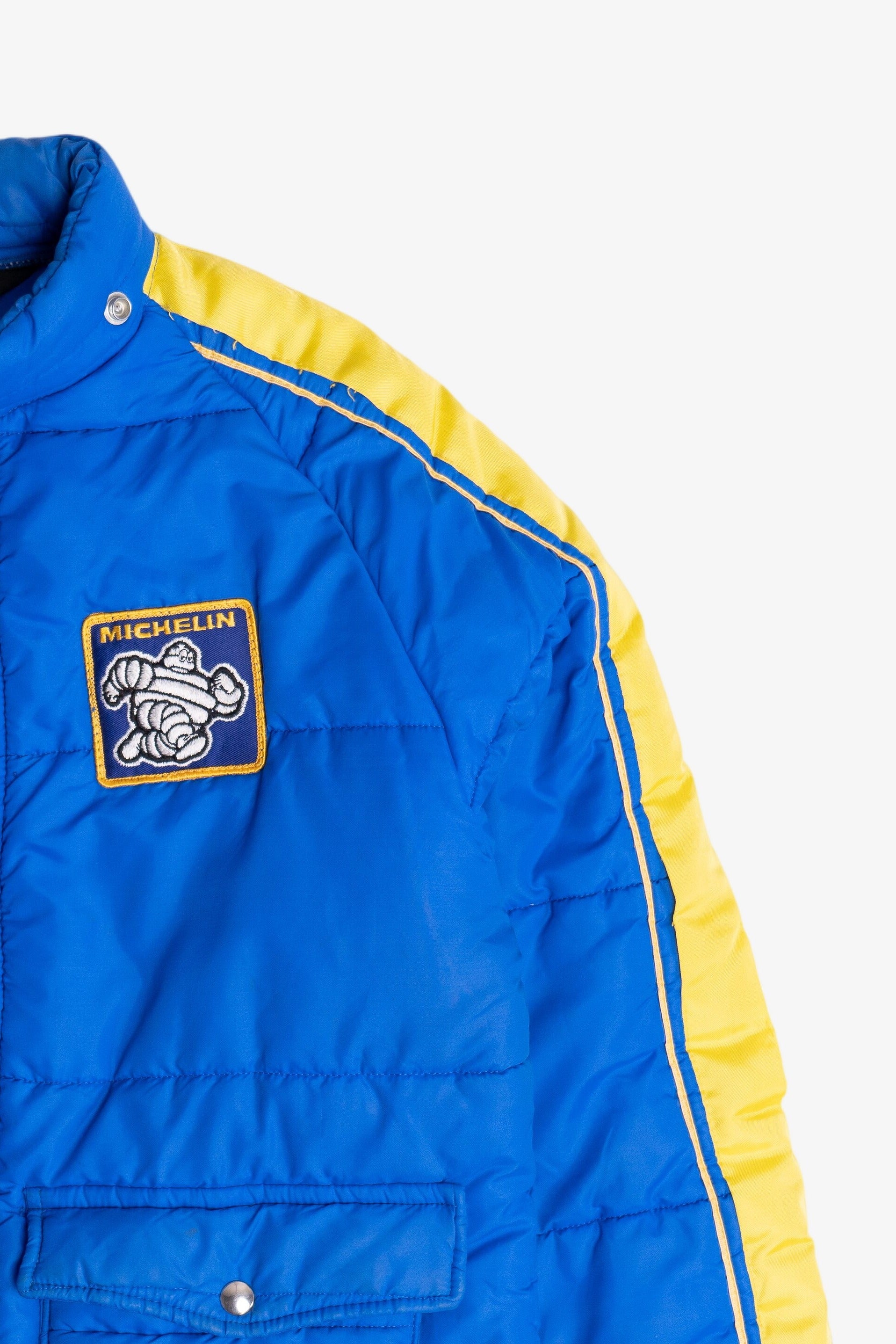 Vintage Swingster Michelin Man Patch Sleeve Spellout Puffer Jacket (1980s)
