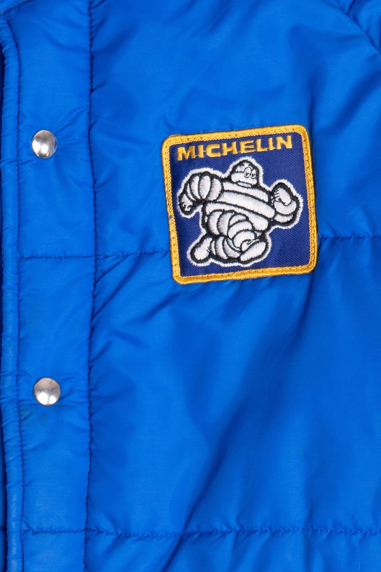 Vintage Swingster Michelin Man Patch Sleeve Spellout Puffer Jacket (1980s)