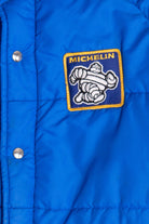 Vintage Swingster Michelin Man Patch Sleeve Spellout Puffer Jacket (1980s)