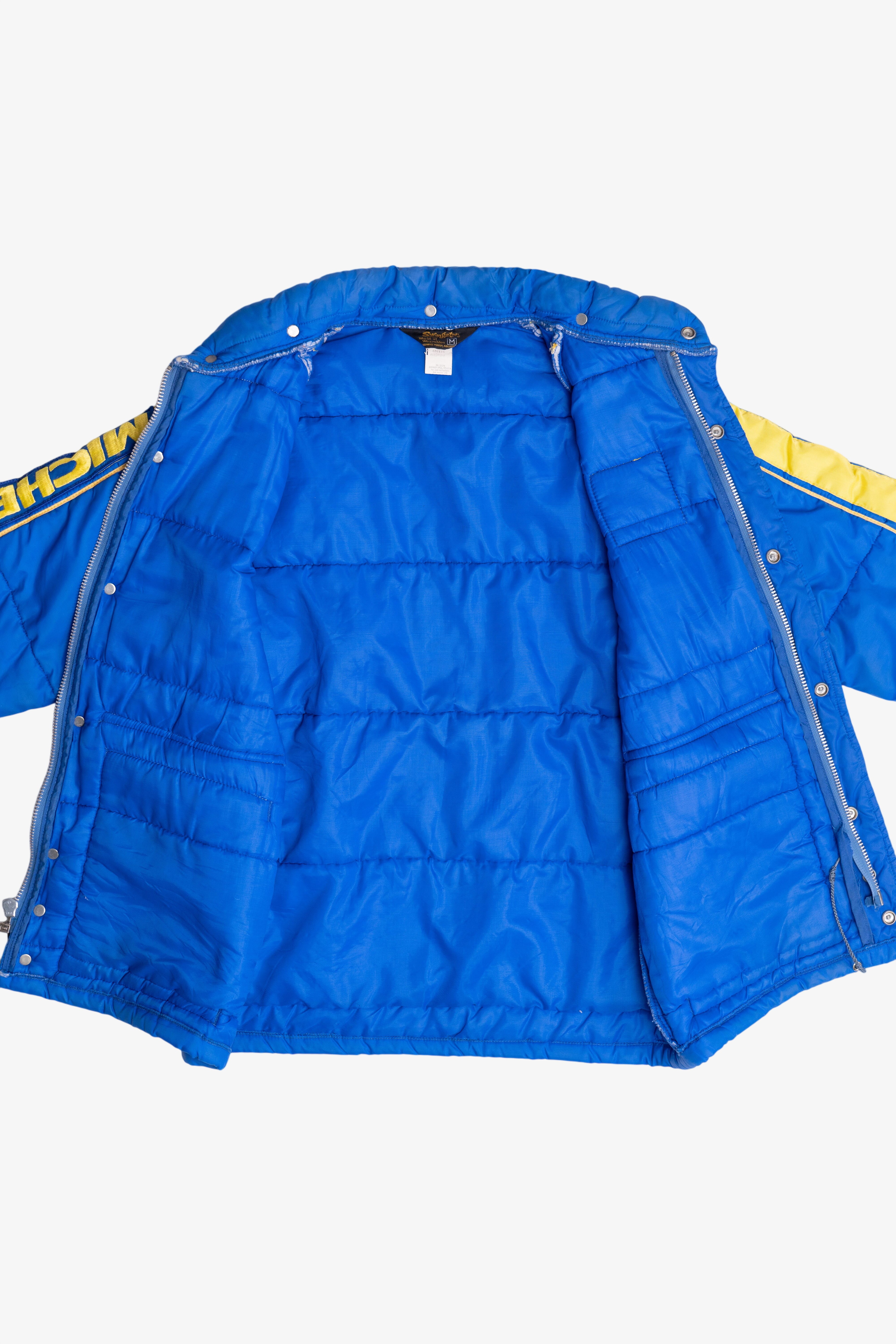 Vintage Swingster Michelin Man Patch Sleeve Spellout Puffer Jacket (1980s)