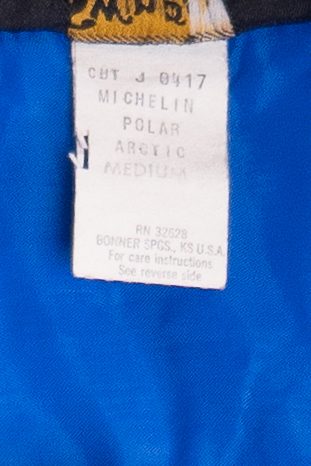 Vintage Swingster Michelin Man Patch Sleeve Spellout Puffer Jacket (1980s)