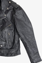 Vintage Unik International Inc. Distressed Leather Motorcycle Jacket (1990s)