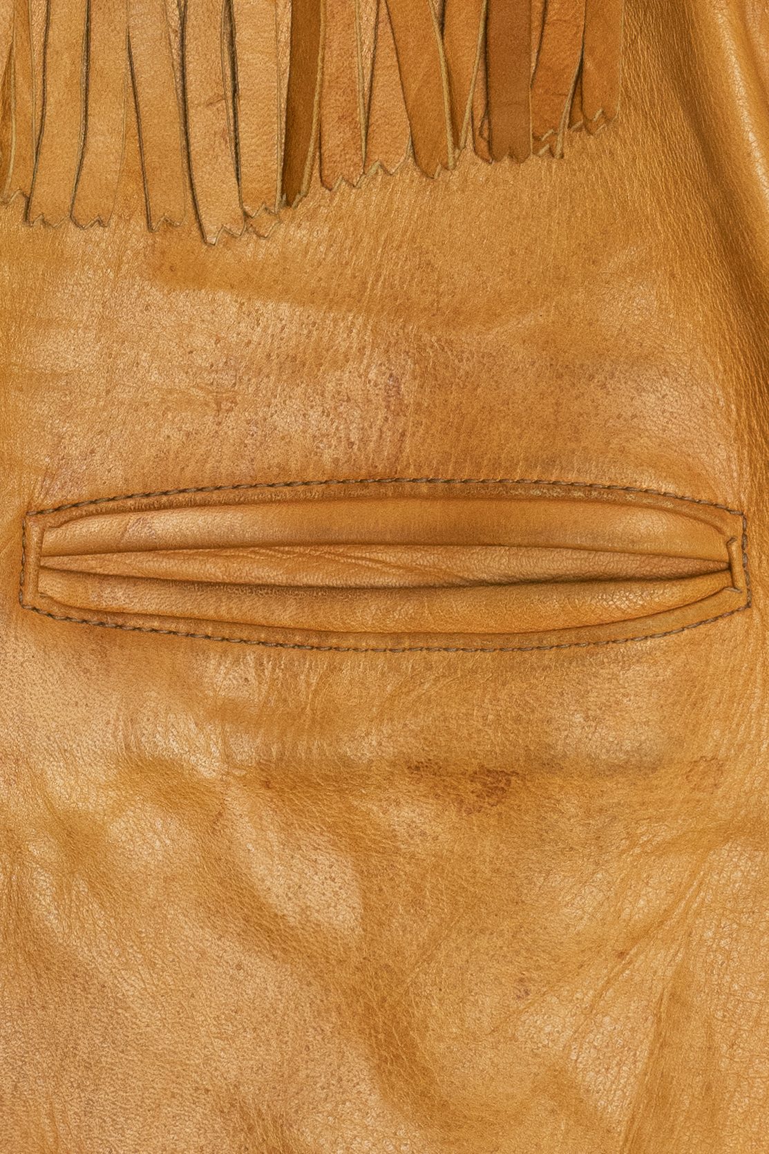 Vintage Distressed Jansha Tanning Co. Fringe Leather Jacket (1970s)