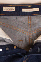 Vintage Pocket Fringe Levi's Cutoff Denim Shorts (2000s)