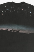 Vintage Distressed "The Stars Shine Brighter In Yellowstone" Howling Wolf Wraparound Print T-Shirt (1990s)