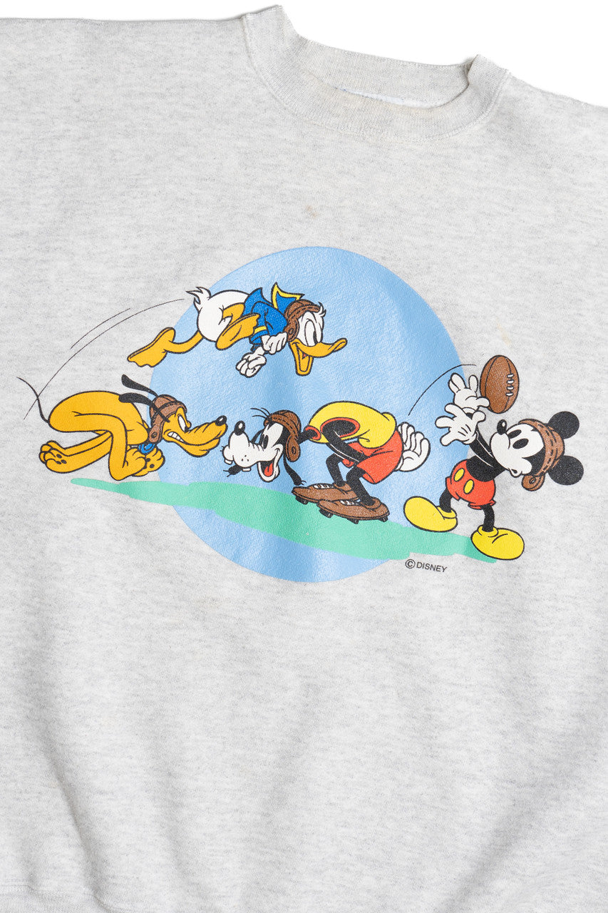 Vintage Disney Mickey Mouse Donald Duck Playing Football Sweatshirt (1990s)
