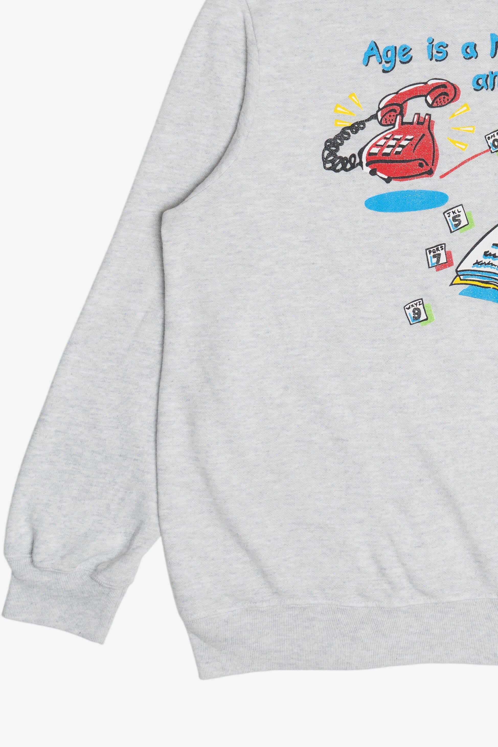 Vintage "Age Is A Number And Mine Is Unlisted" Phone Book Humor Sweatshirt (1980s)