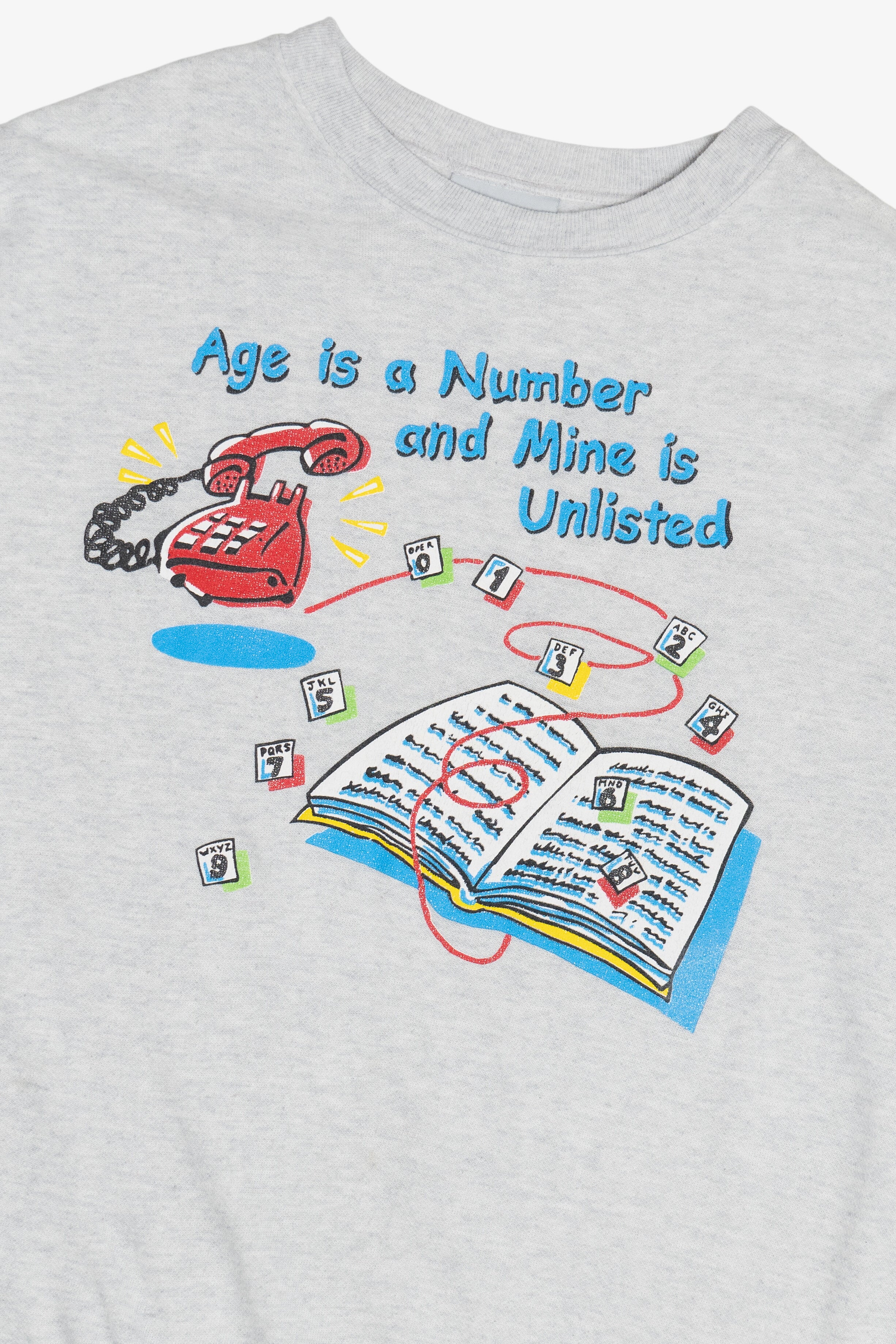 Vintage "Age Is A Number And Mine Is Unlisted" Phone Book Humor Sweatshirt (1980s)