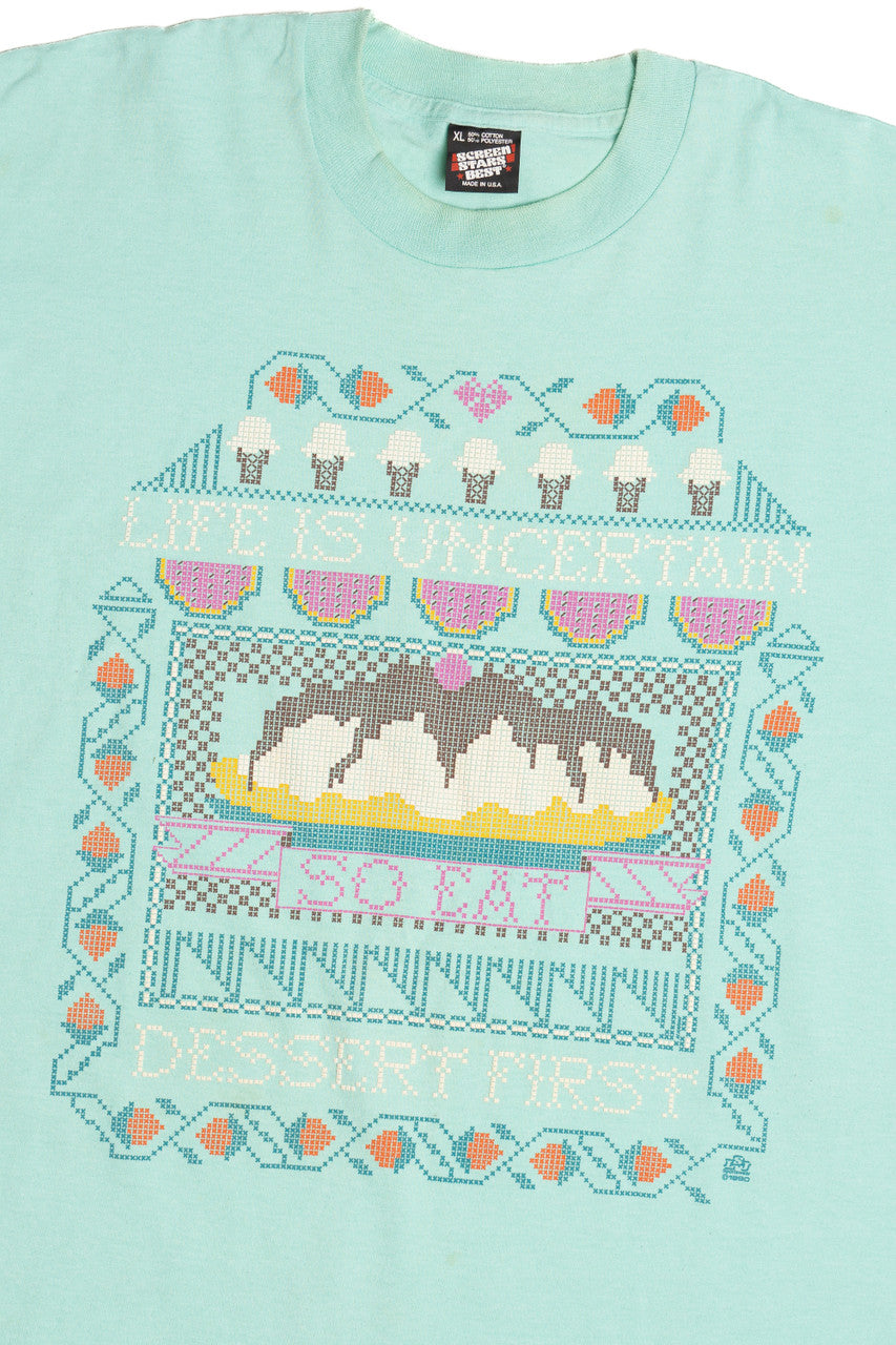 Vintage "Life Is Uncertain So Eat Dessert First" Embossed Print T-Shirt (1990s)
