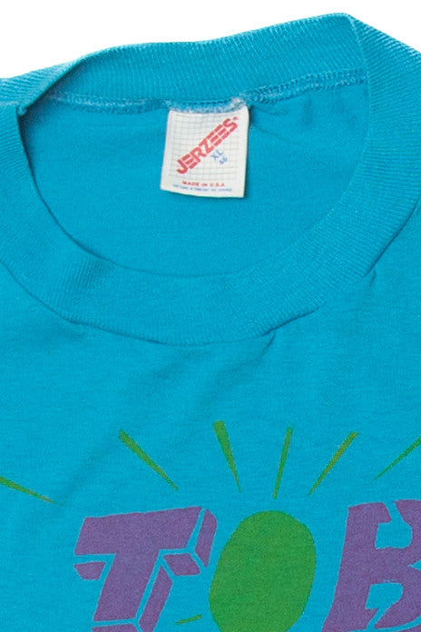 Vintage "Calvin In Tobago" Jerzees T-Shirt (1990s)