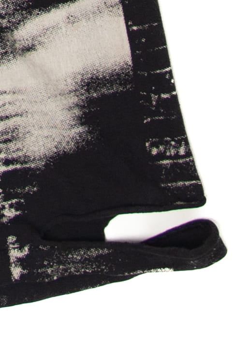 Vintage John Lennon All Over Print Distressed T-Shirt (1990s)