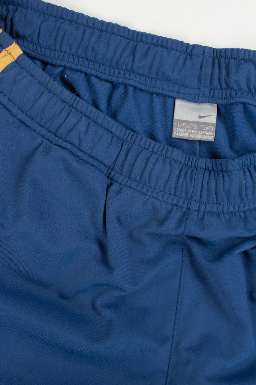 Vintage Blue & Yellow Nike Track Pants (sz. XL)