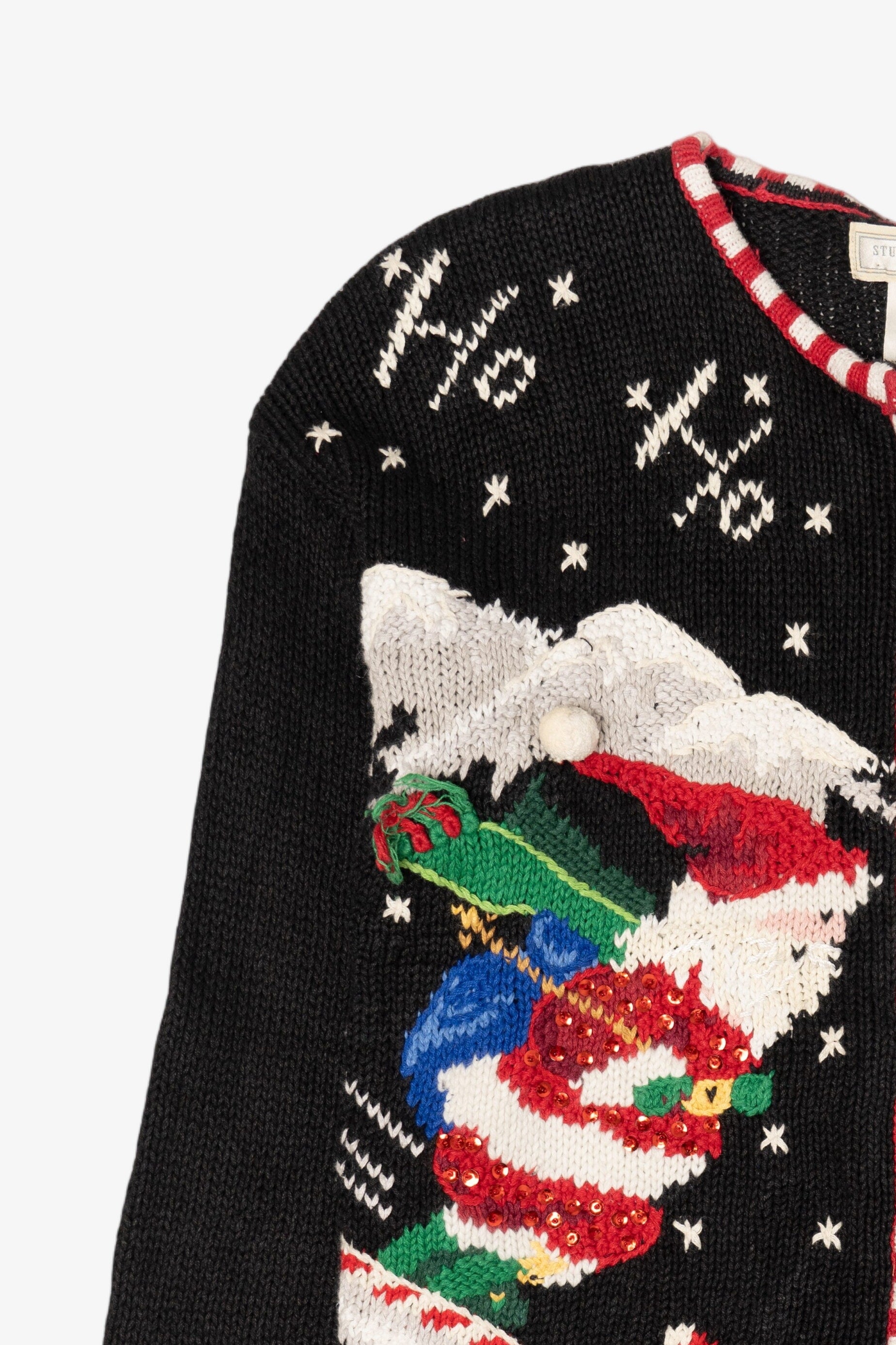 Vintage Black Studio Works Santa Skiing Parachuting Ugly Christmas Cardigan (1990s)