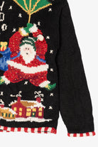 Vintage Black Studio Works Santa Skiing Parachuting Ugly Christmas Cardigan (1990s)