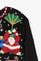 Vintage Black Studio Works Santa Skiing Parachuting Ugly Christmas Cardigan (1990s)