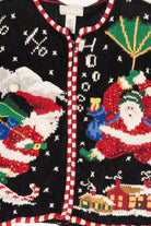 Vintage Black Studio Works Santa Skiing Parachuting Ugly Christmas Cardigan (1990s)