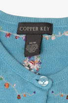 Vintage Blue Copper Key Dancing Reindeer Ugly Christmas Cardigan (2000s)