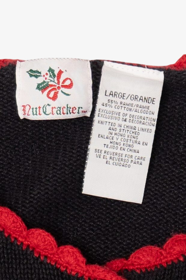 Vintage Black Nutcracker Santa Ugly Christmas Cardigan (1990s)