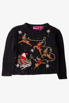 Kids black Christmas pullover featuring Santa in sleigh and four reindeer with snowflake decorations.