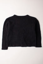 Kids black ugly Christmas pullover sweater laid flat showing the back side on white background
