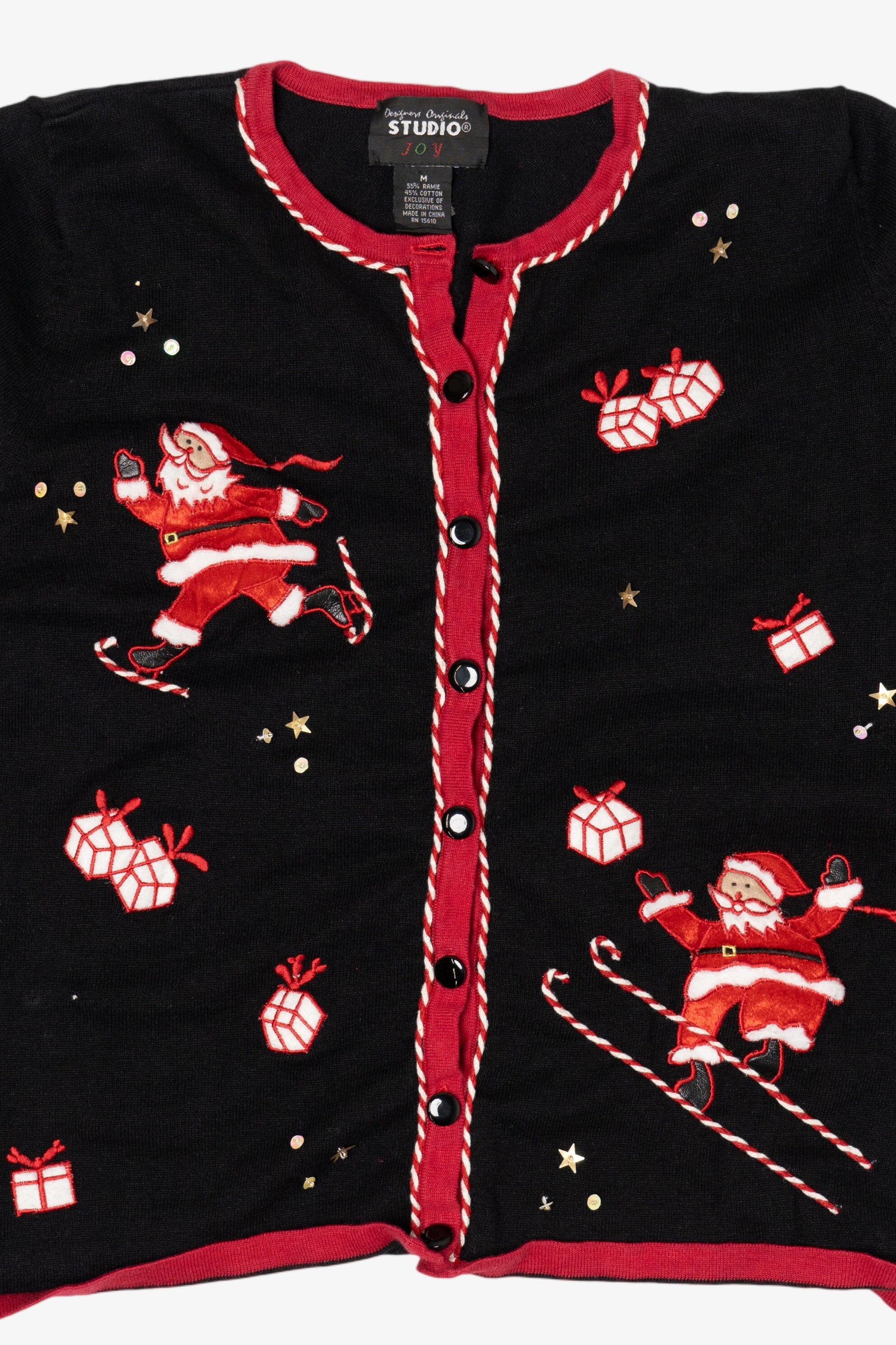Vintage Black Studio Joy Santa Skating Ugly Christmas Cardigan (1990s)