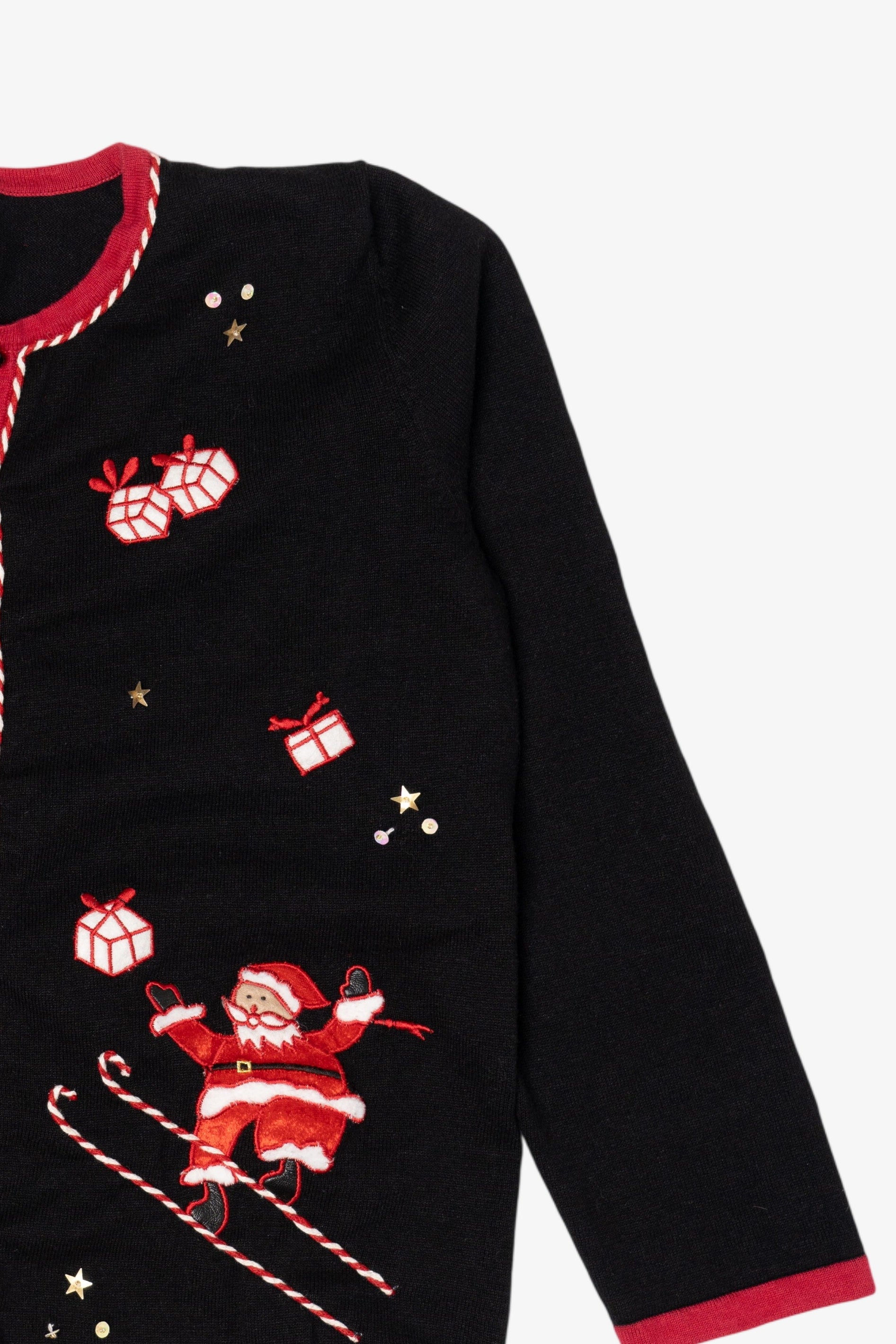 Vintage Black Studio Joy Santa Skating Ugly Christmas Cardigan (1990s)