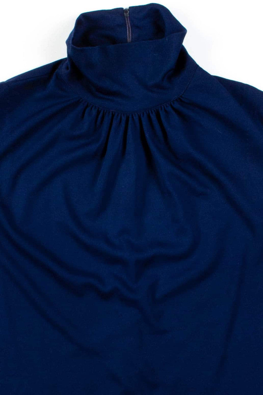 Navy Sleeveless Turtleneck Blouse