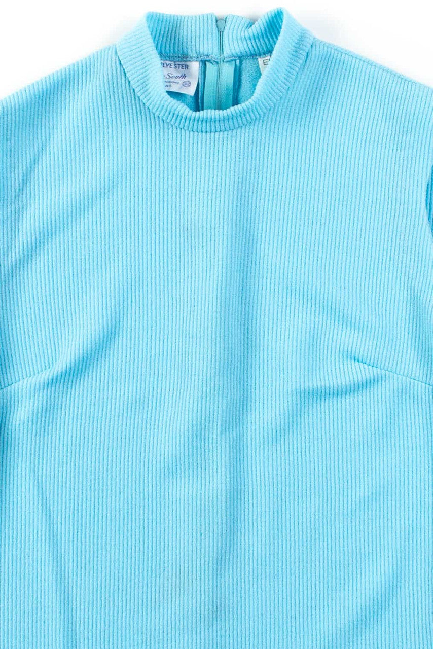 Blue Ribbed Sleeveless Turtleneck Top