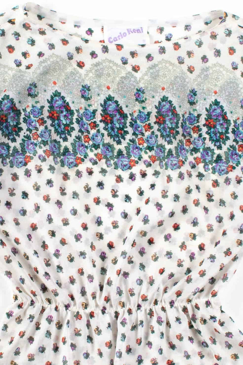 Sheer Floral Peplum Top